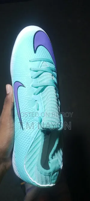 Mint green and purple stylish football boots, used for 3-4 days like new