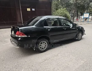 মিতসুবিশি ল্যান্সার ২০১১ কালো