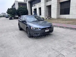 মিতসুবিশি ল্যান্সার ২০১০ গ্রে