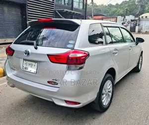 টয়োটা করোল্লা ফিল্ডার ১.৫ হাইব্রিড এফডব্লিউডি ২০১৬ সিলভার