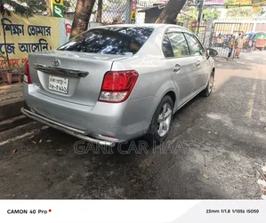 টয়োটা অ্যাক্সিও ১.৫ জি টু-হুইল ড্রাইভ ২০১৩ সিলভার