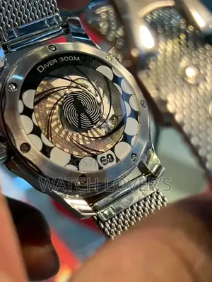 Omega 007
60th Anniversary