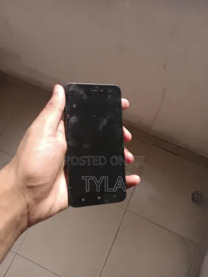 Photo - Mobile Phone 32 GB Red