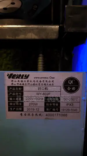 Photo - Manual Juice Wrapping Machine