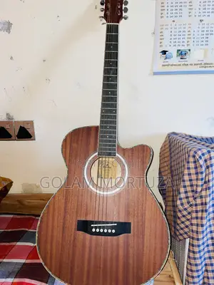 Photo - New Guitar Only 2 Month Used
