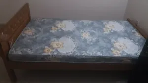 Photo - Wooden Bed With Mattress