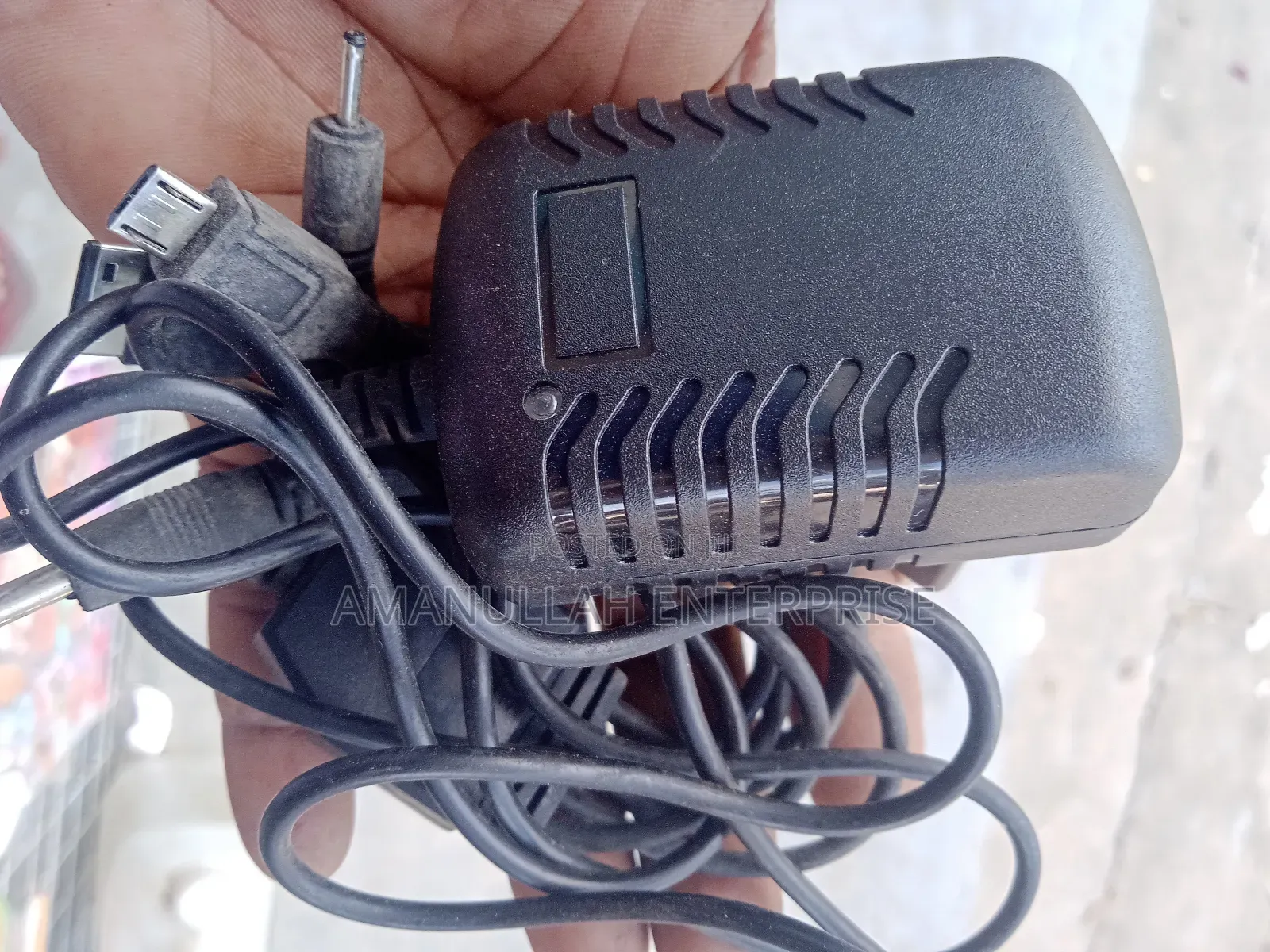Universal Ac-Dc Power Adapter Automatic Voltage Selection.