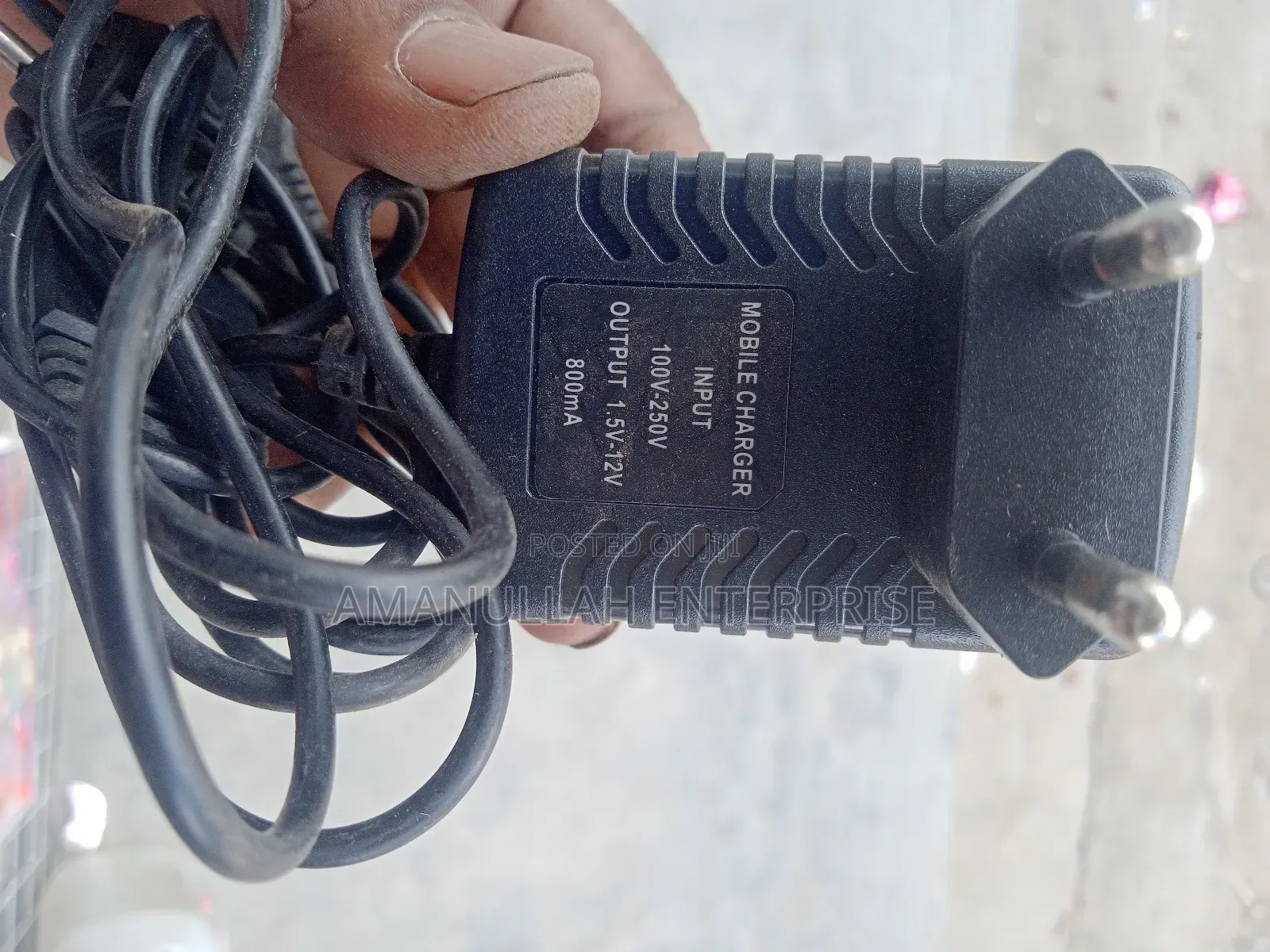 Universal Ac-Dc Power Adapter Automatic Voltage Selection.