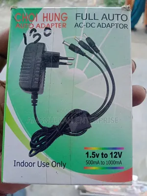 Photo - Universal Ac-Dc Power Adapter Automatic Voltage Selection.