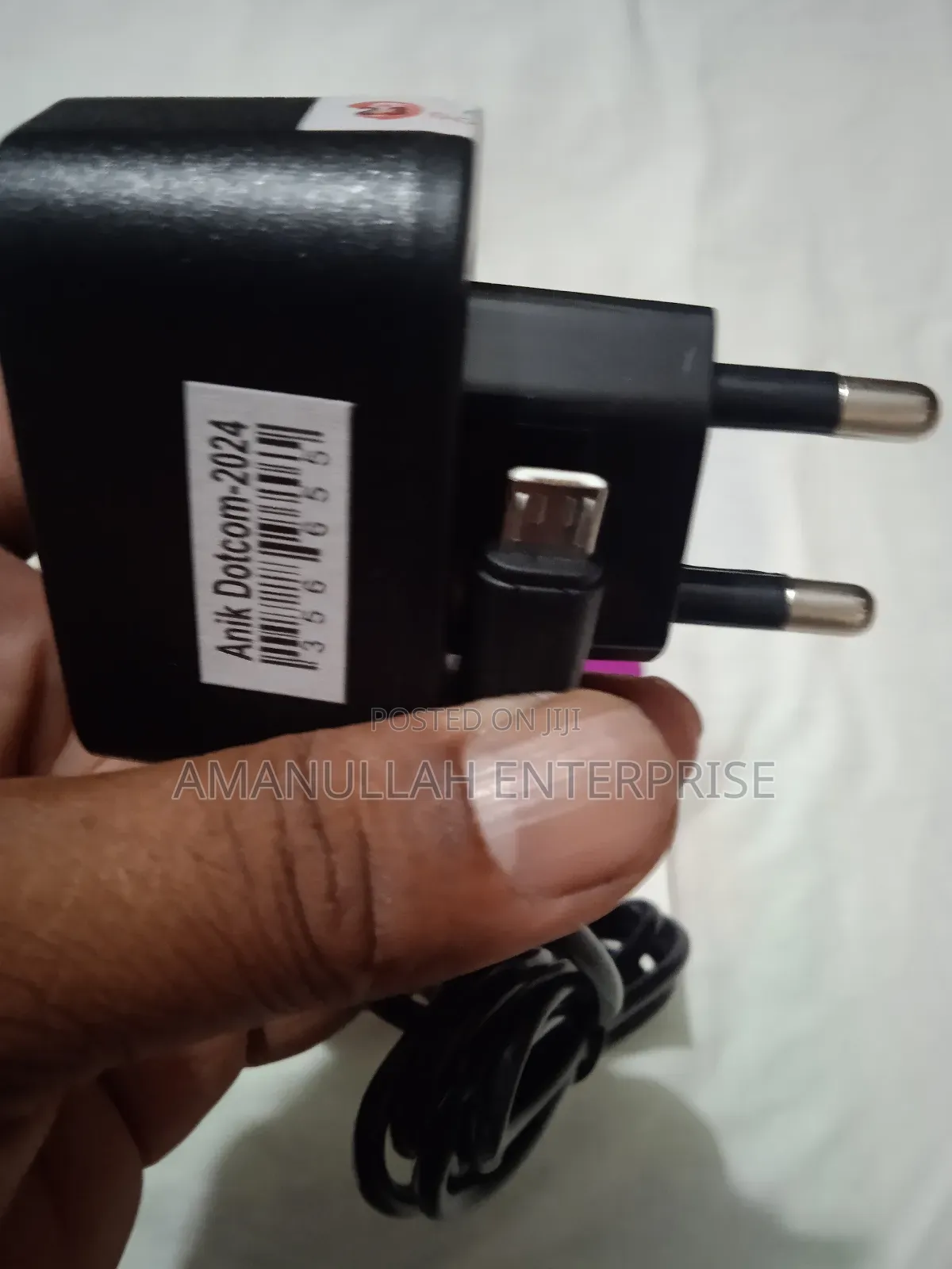 Button Phone Charger.