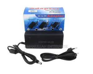 Photo - Ac - Dc Power Adapter Powering Various Electronic Devices.