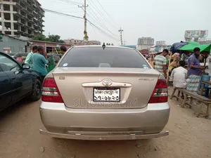 Photo - Toyota Corolla Sedan 2001 Gold