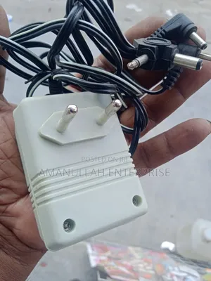 New Star Variable Ac to Dc 1.5v to 12v Dc Adapter 350max.