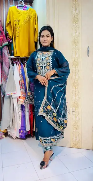 Student Doing Embroidery Work on Georgette Fabric.