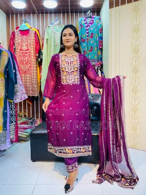 Student Doing Embroidery Work on Georgette Fabric.