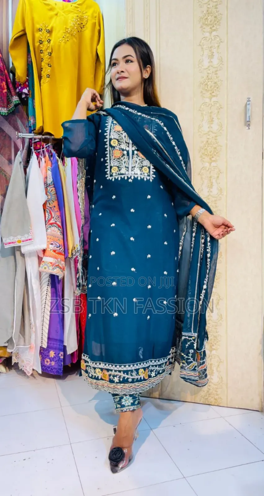 Student Doing Embroidery Work on Georgette Fabric.