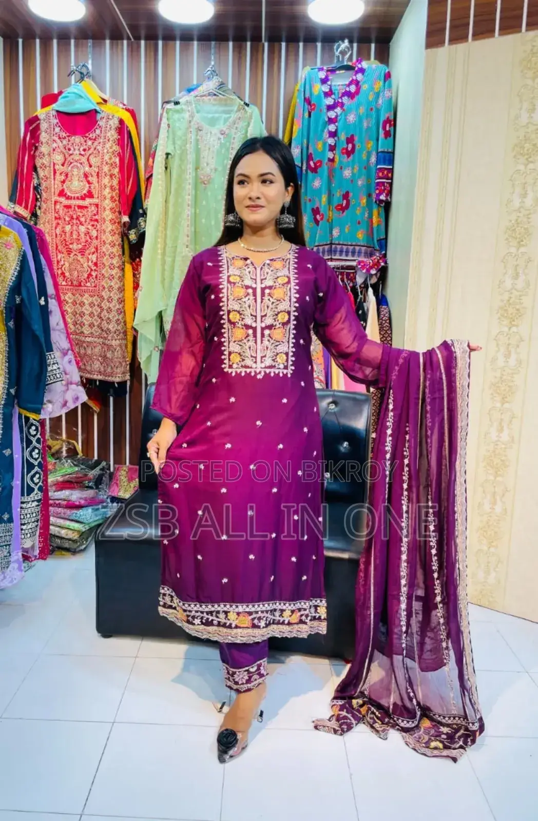 Student Doing Embroidery Work on Georgette Fabric.