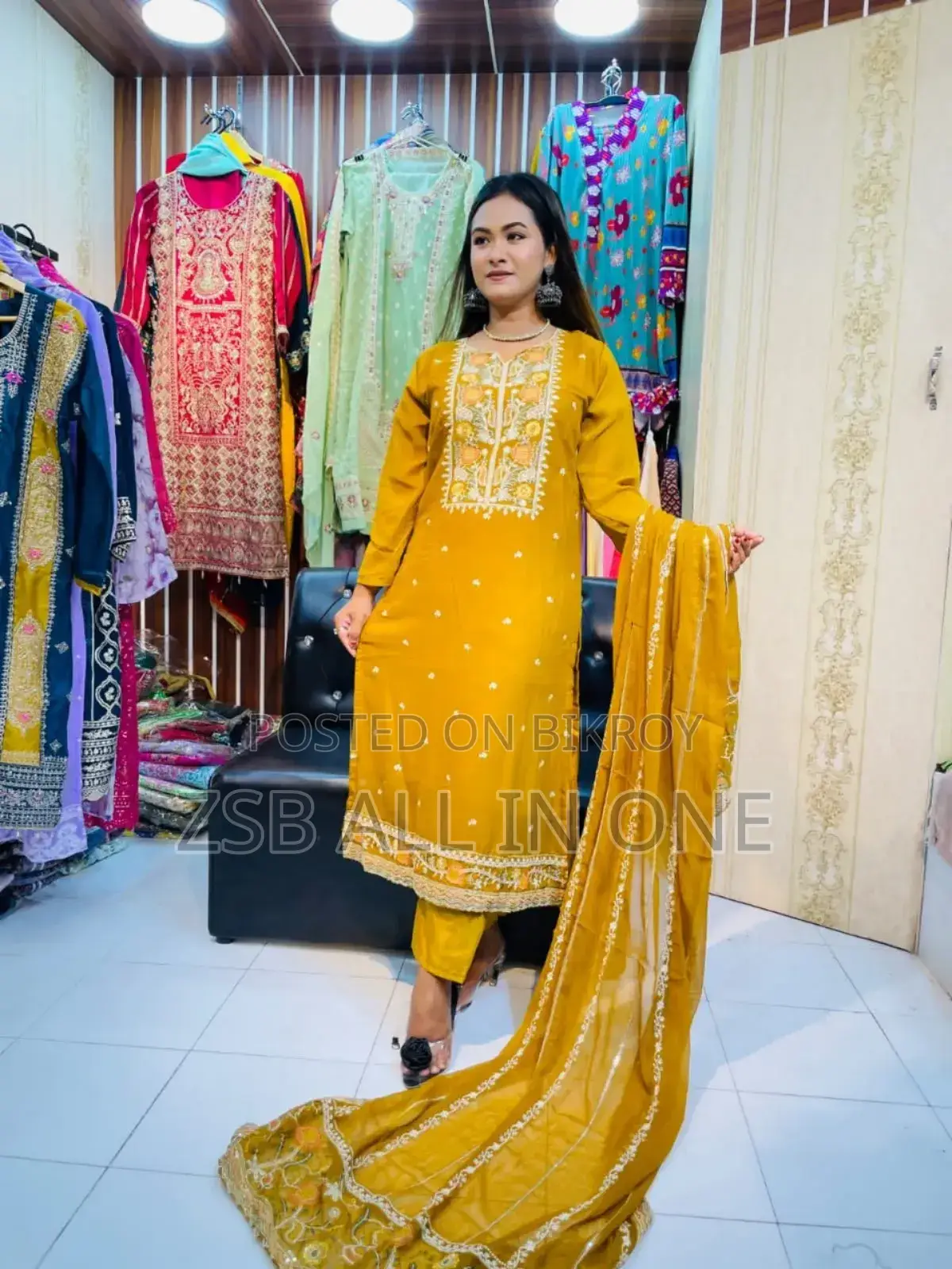 Student Doing Embroidery Work on Georgette Fabric.