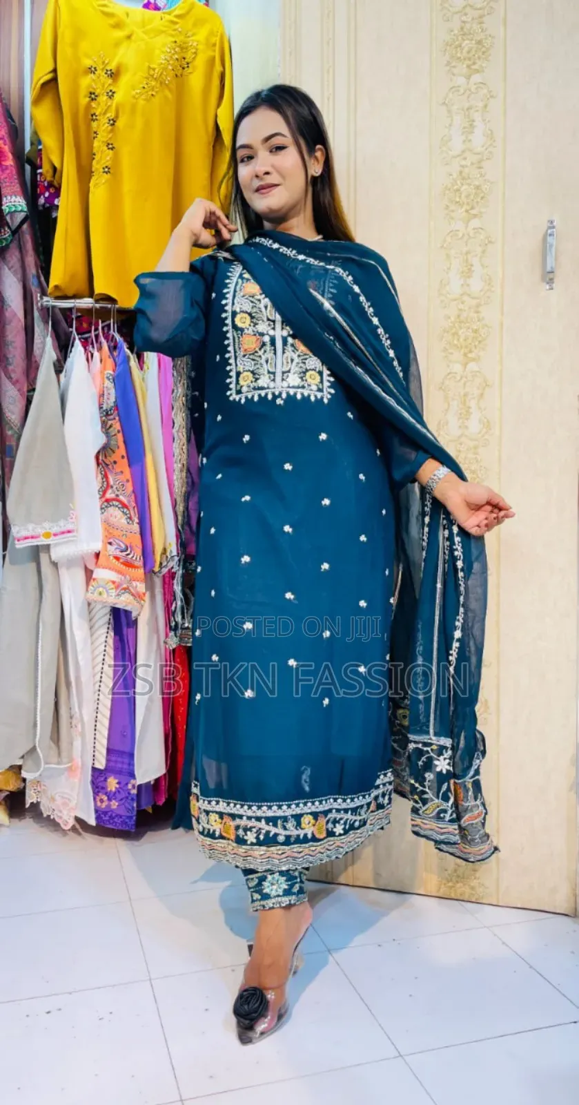 Student Doing Embroidery Work on Georgette Fabric.