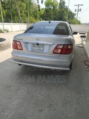 Photo - Nissan Sunny B15 Sedan 1.3 2002 Silver
