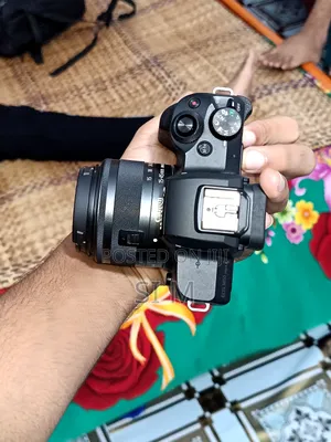Photo - Canon M50 Mark 2 
With Kid Lens 15-45 
+ Box and Charger