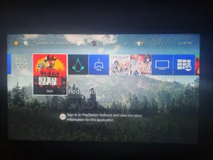 Photo - Ps4 Fat 500 Gb With Games