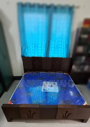 Photo - Wooden Bed With Mattress