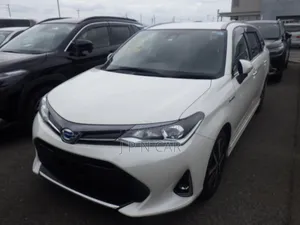 Photo - Toyota Corolla Fielder 1.5 Hybrid FWD 2020 Pearl