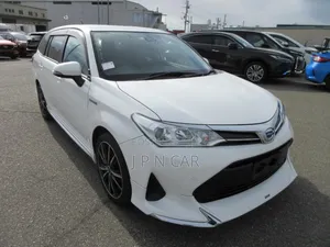 Photo - Toyota Corolla Fielder 1.5 Hybrid FWD 2020 White
