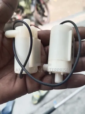 Photo - Mini Submersible Water Pump, Designed to Be Fully Submerged.