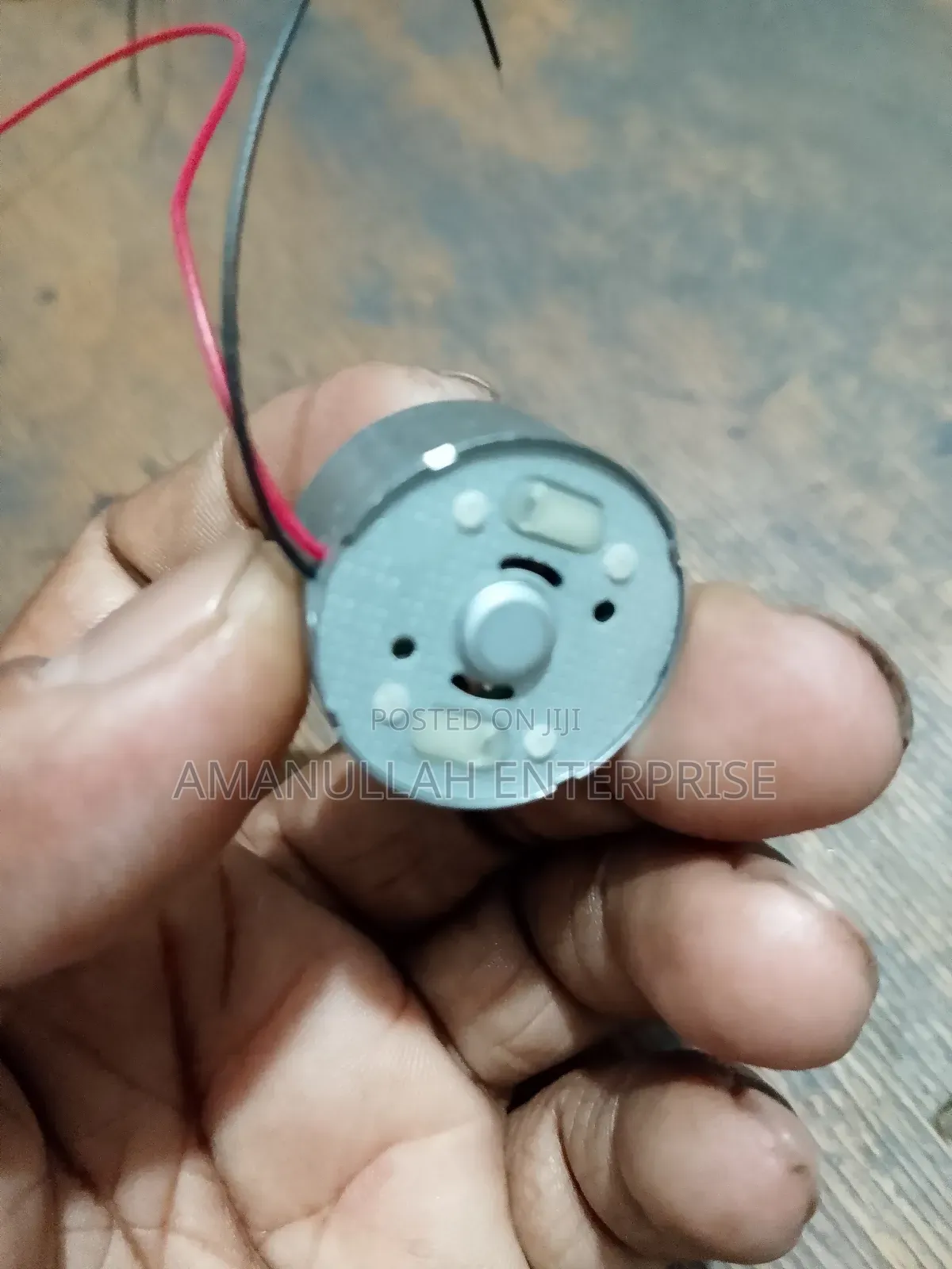 Small, Round Dc Motor Commonly Used in Various Diy Projects,