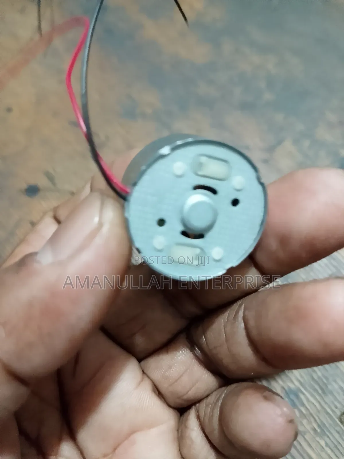 Small, Round Dc Motor Commonly Used in Various Diy Projects,