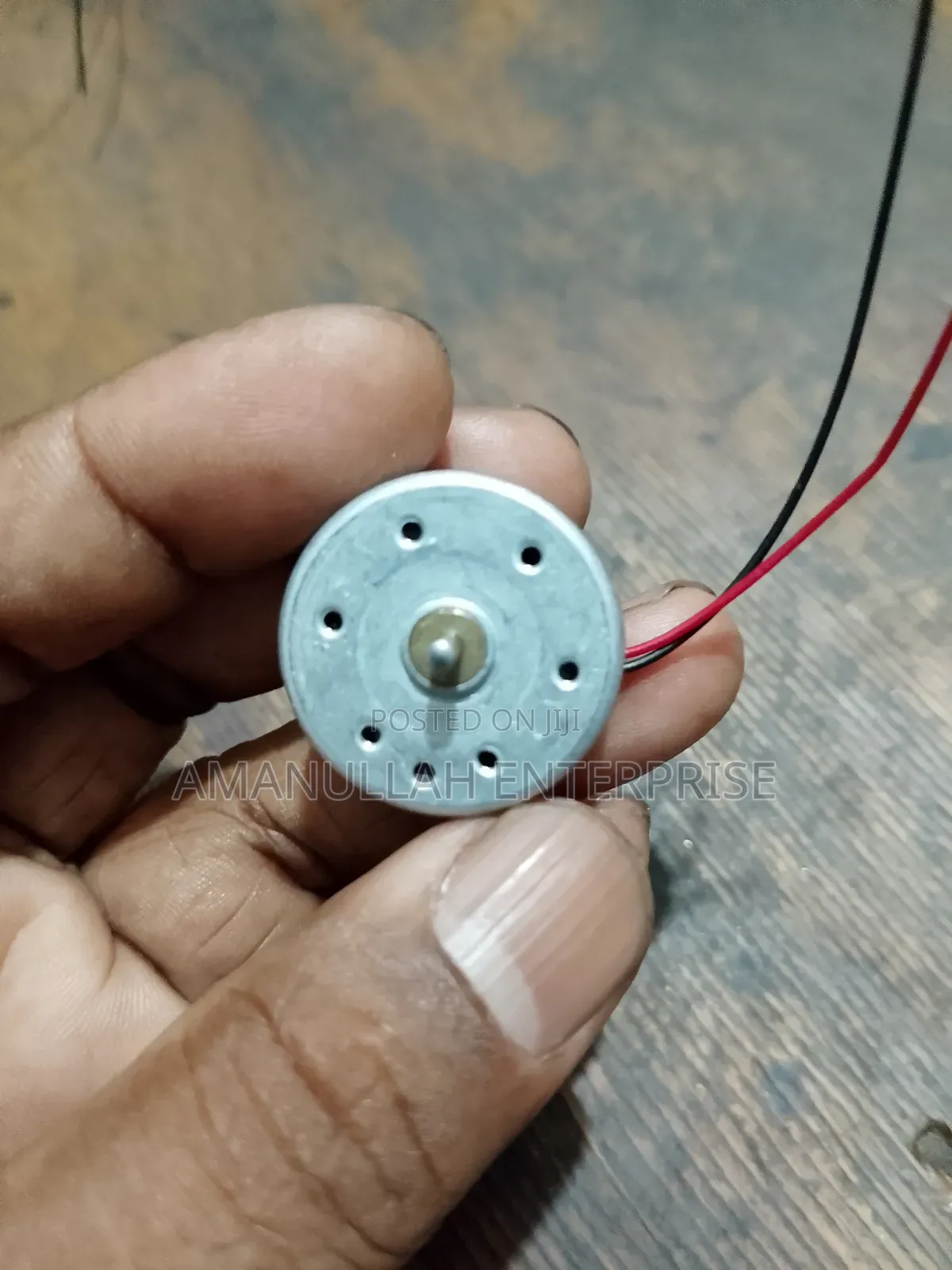 Small, Round Dc Motor Commonly Used in Various Diy Projects,