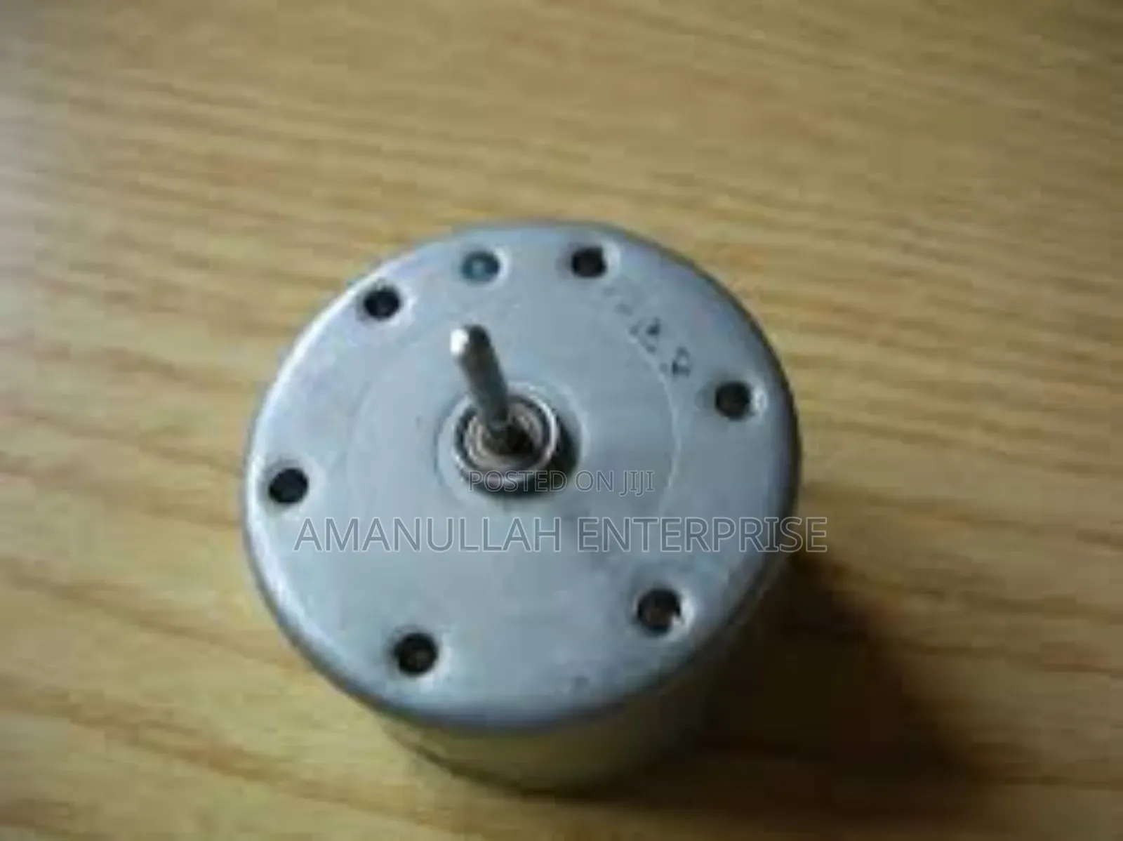 Small, Round Dc Motor Commonly Used in Various Diy Projects,