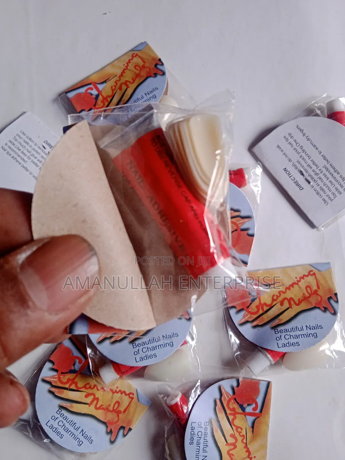 "Beautiful Nails of Charming Ladies" Which Includes Nail Adhesive.