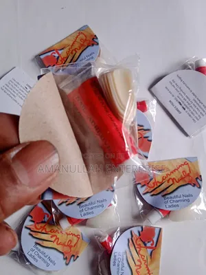 "Beautiful Nails of Charming Ladies" Which Includes Nail Adhesive.