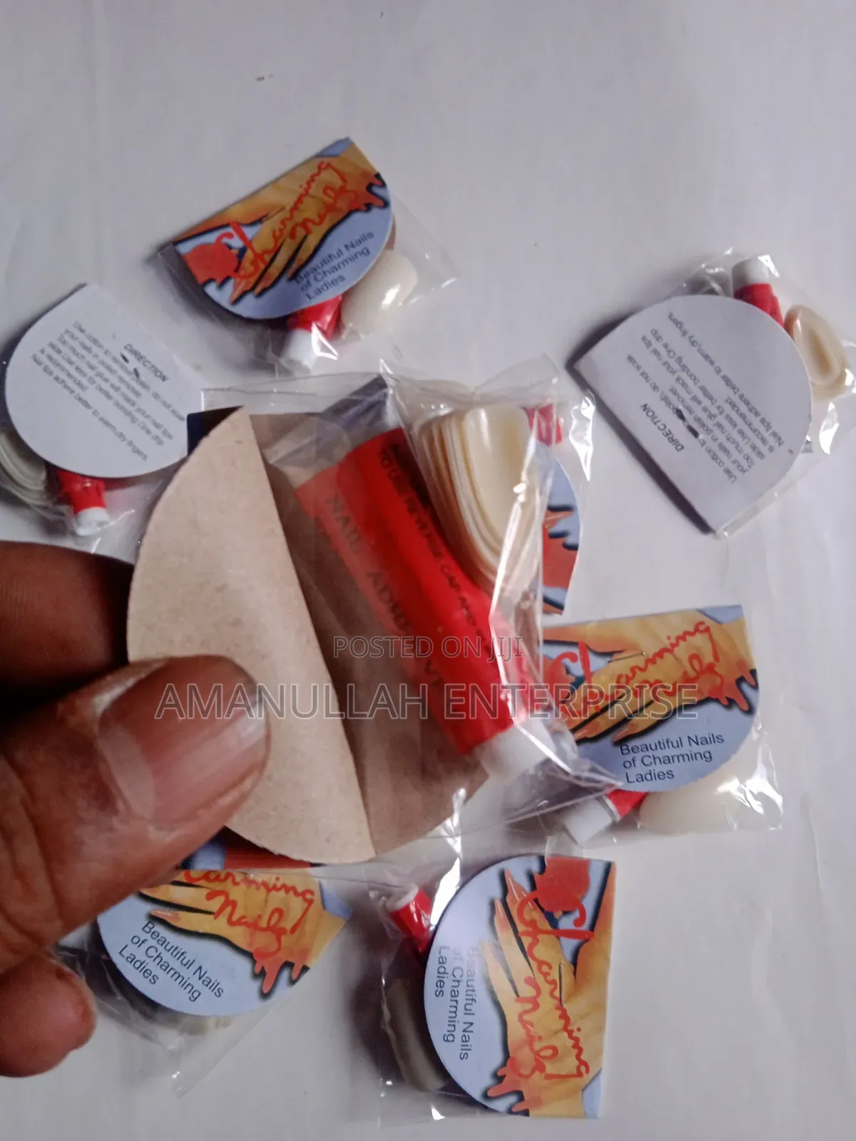 "Beautiful Nails of Charming Ladies" Which Includes Nail Adhesive.