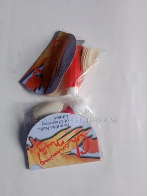 "Beautiful Nails of Charming Ladies" Which Includes Nail Adhesive.