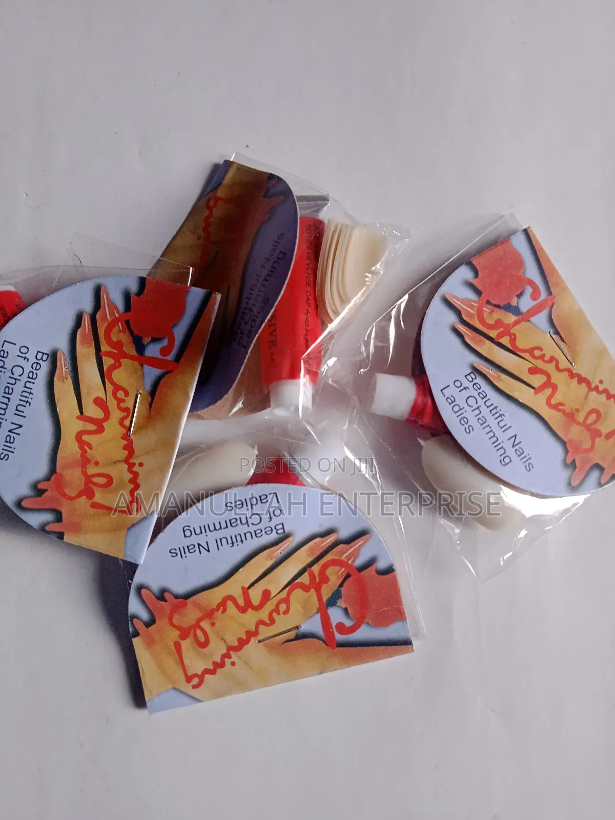 "Beautiful Nails of Charming Ladies" Which Includes Nail Adhesive.