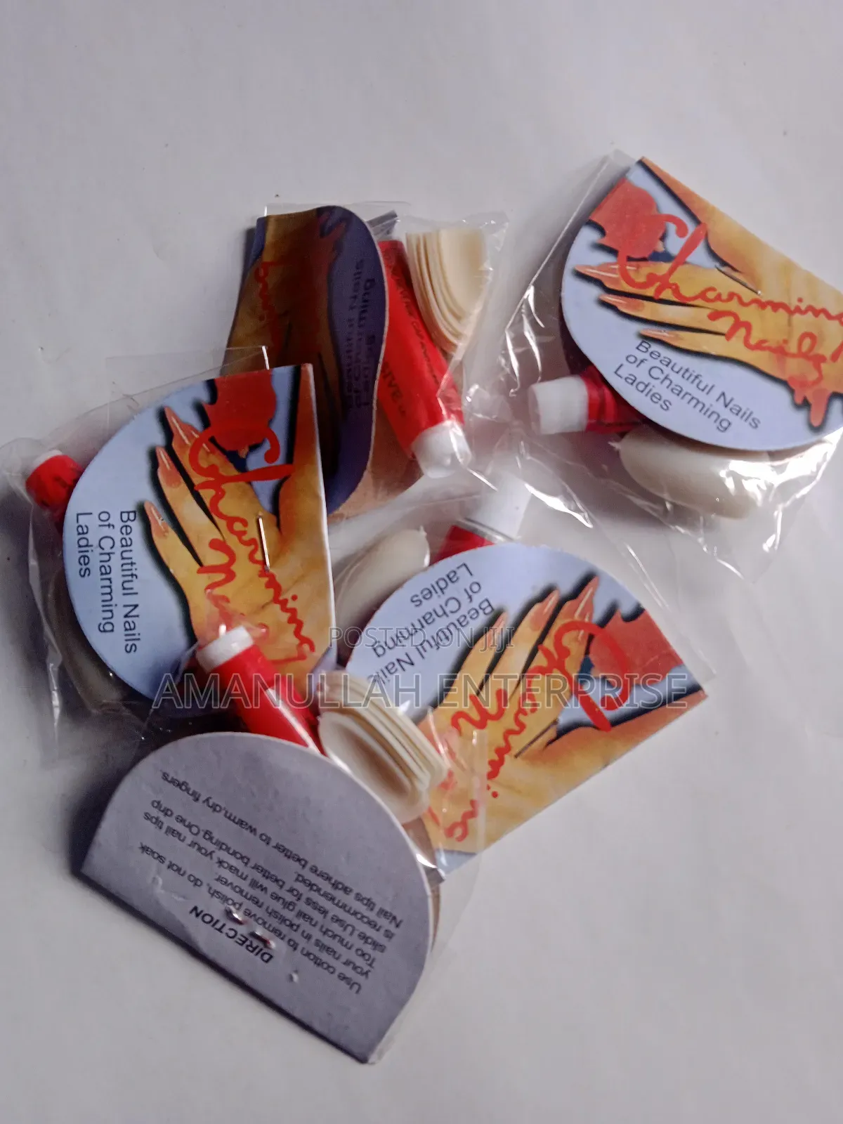 "Beautiful Nails of Charming Ladies" Which Includes Nail Adhesive.