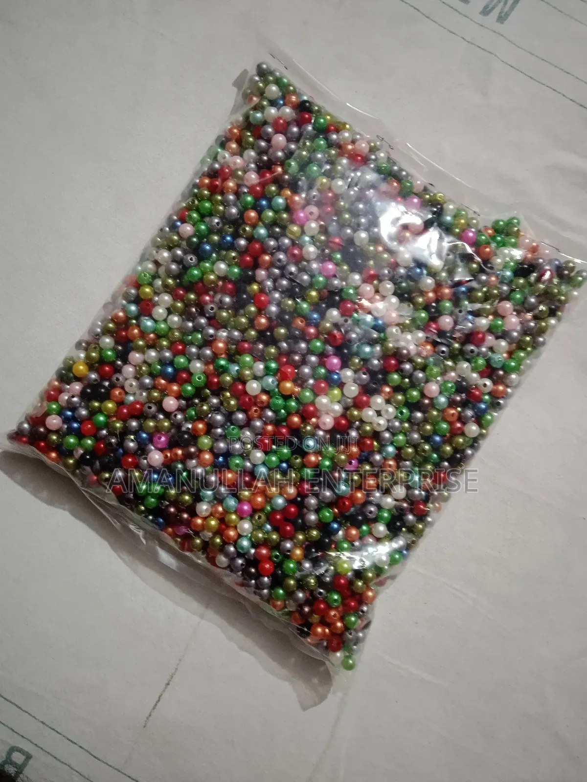Mixed-Color Faux Pearl Beads, Commonly Used for Various Crafting.