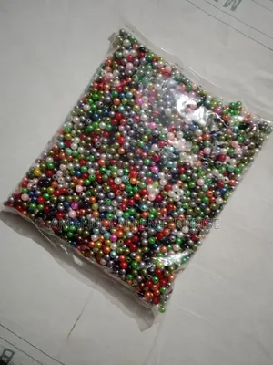 Mixed-Color Faux Pearl Beads, Commonly Used for Various Crafting.