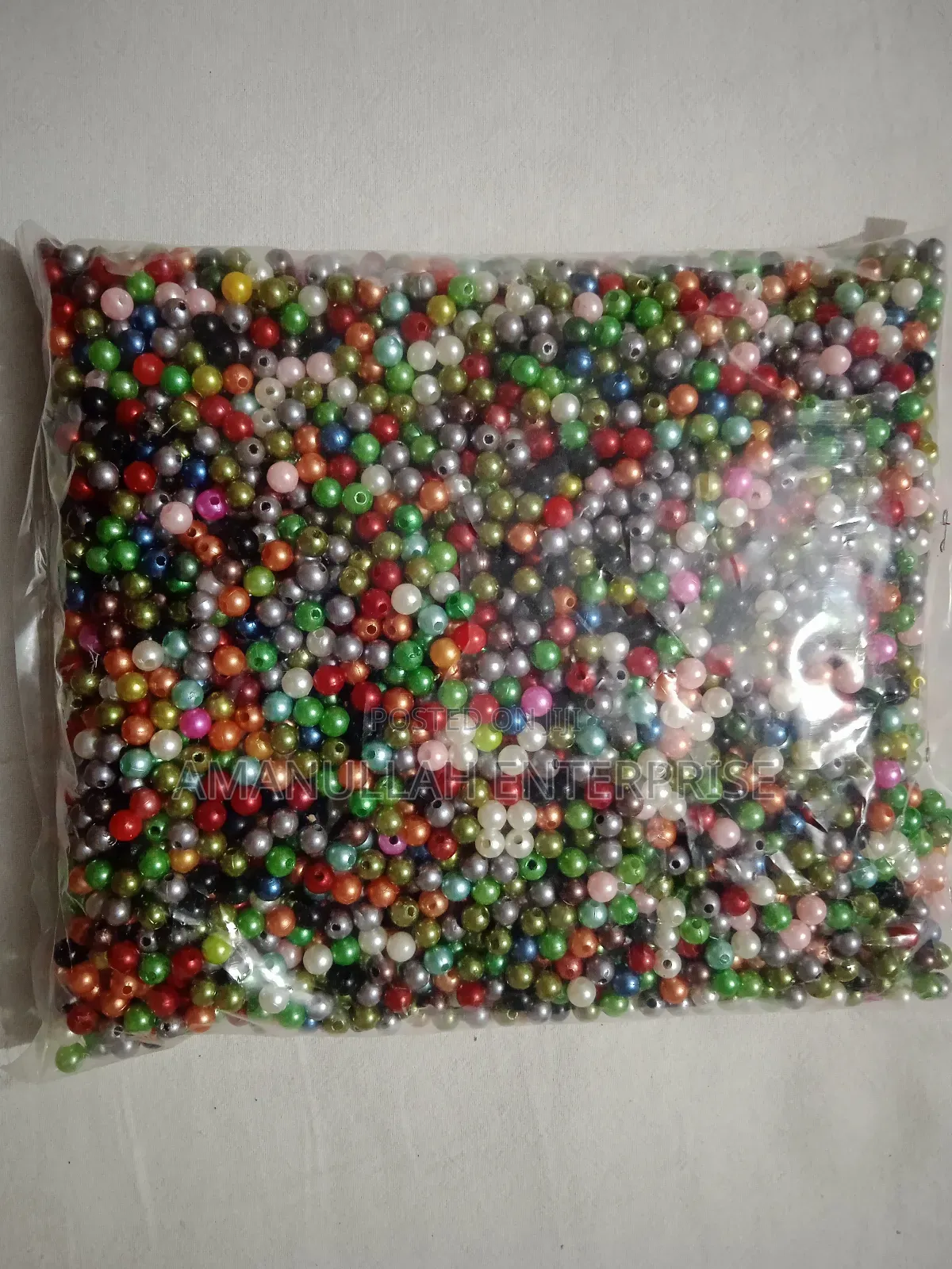 Mixed-Color Faux Pearl Beads, Commonly Used for Various Crafting.