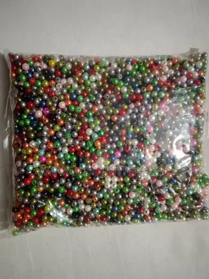 Mixed-Color Faux Pearl Beads, Commonly Used for Various Crafting.