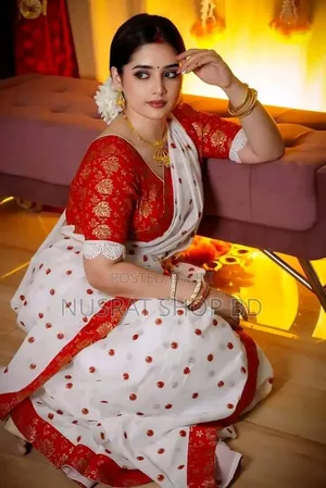 Half Silk Sharee With Blouse Piece
 আকর্ষণীয় লাল পেড়ে সাদা শাড়ী।