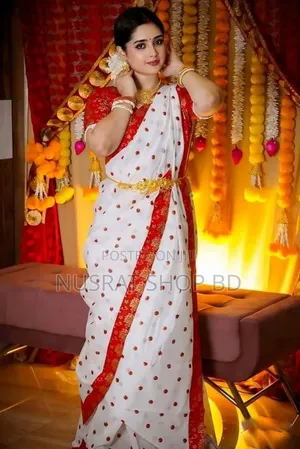 Half Silk Sharee With Blouse Piece
 আকর্ষণীয় লাল পেড়ে সাদা শাড়ী।