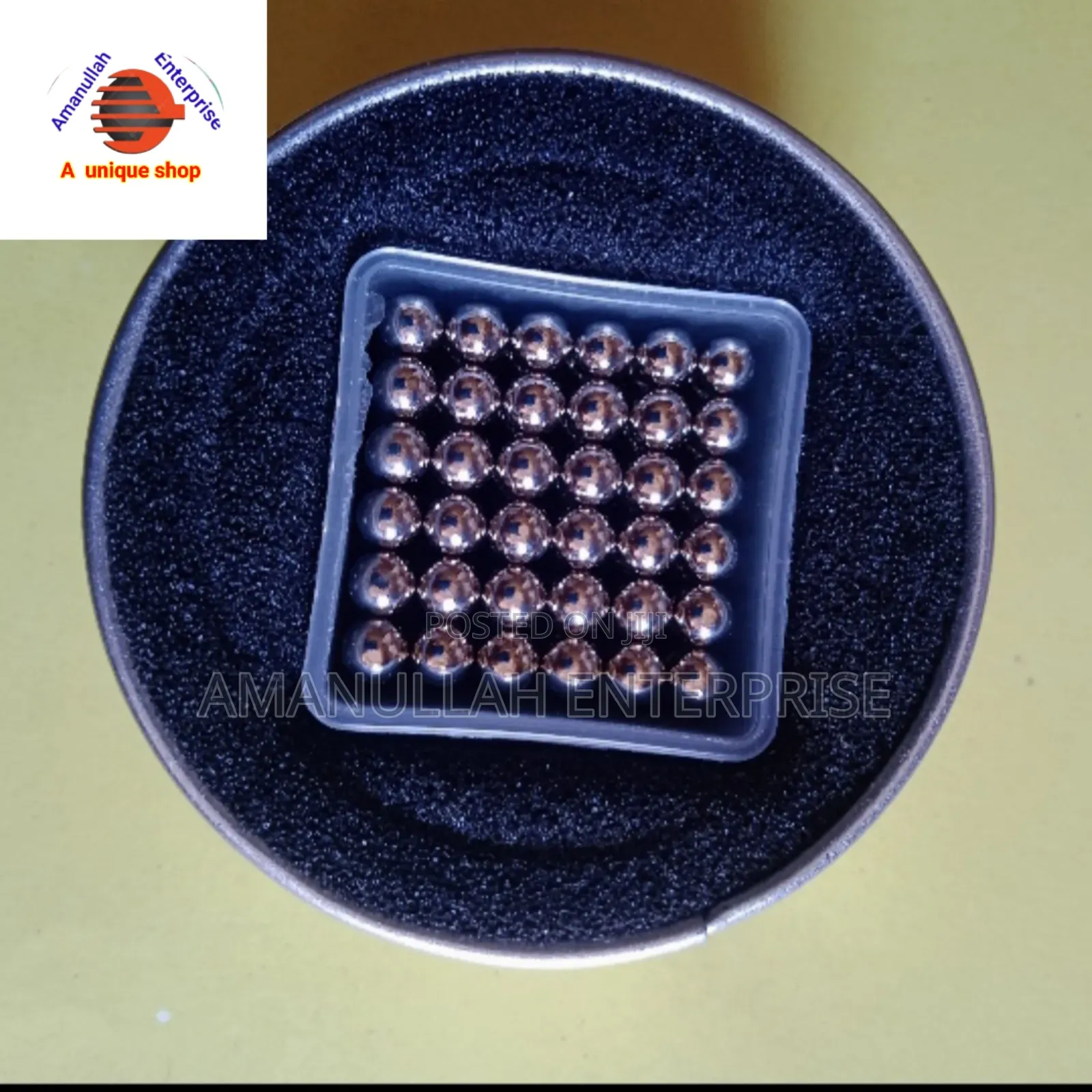 Set of Magnetic Balls, Also Known as Neocubes Used as a Puzzle.