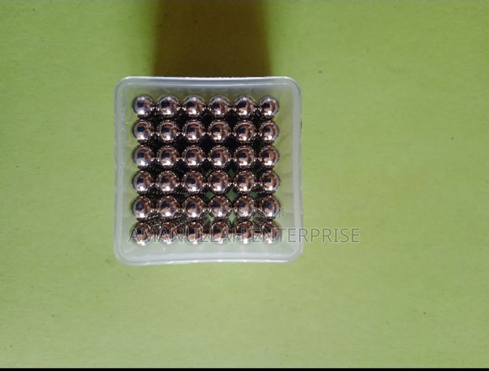 Set of Magnetic Balls, Also Known as Neocubes Used as a Puzzle.