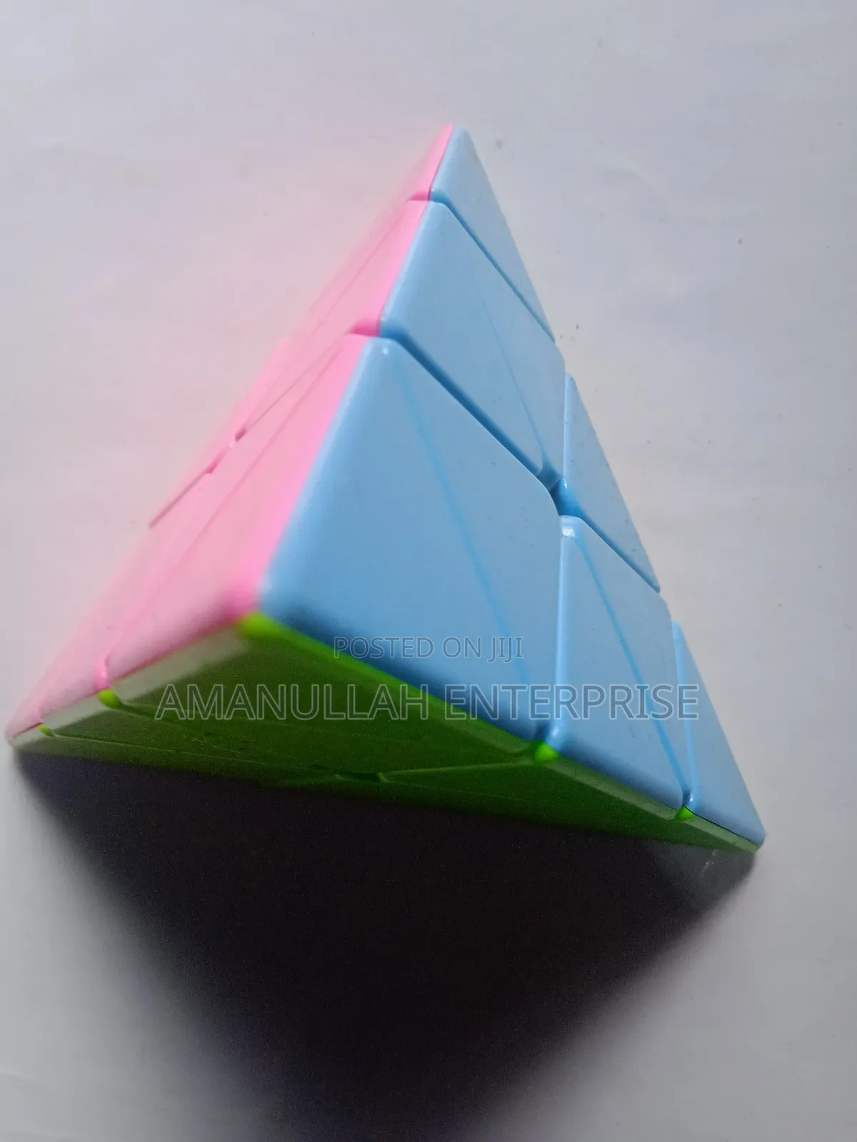 Pyramid Speed Cube, Also Known as a Pyraminx.