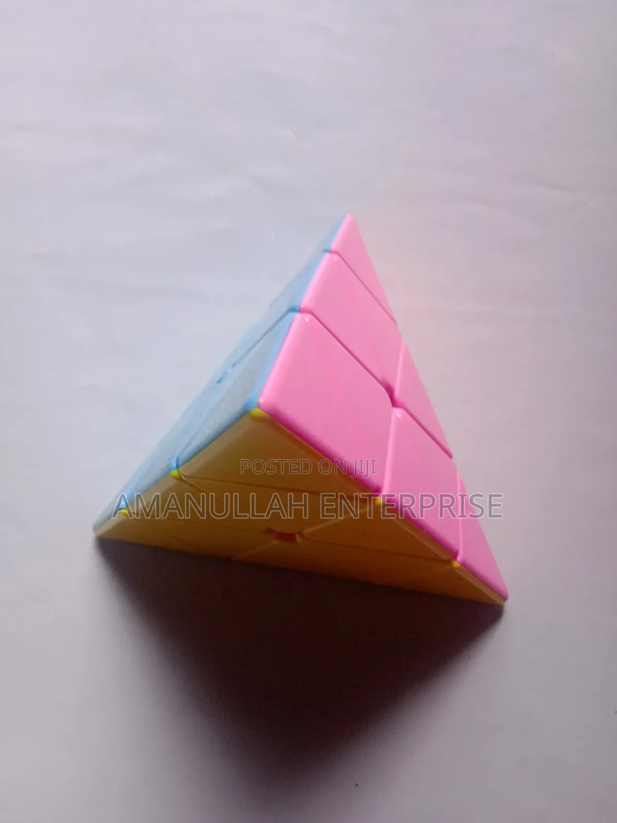 Pyramid Speed Cube, Also Known as a Pyraminx.
